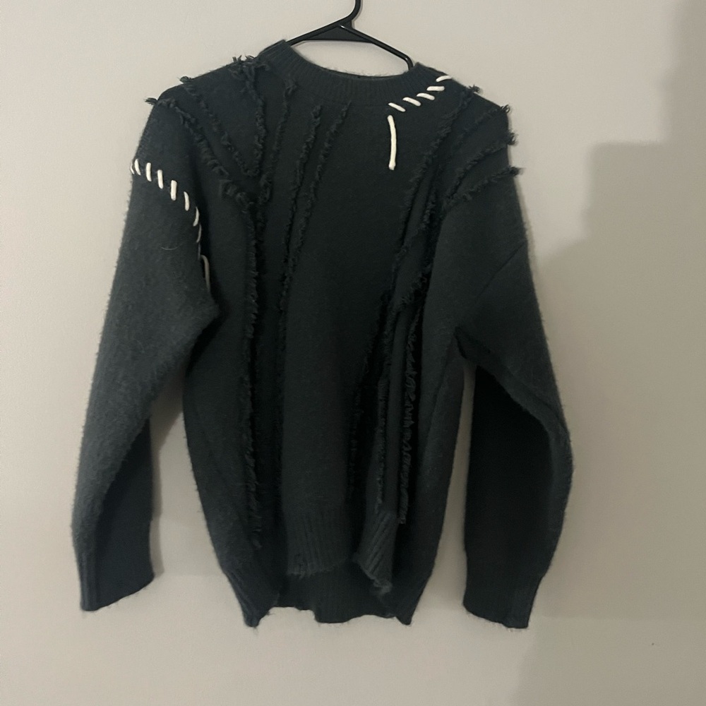 Distressed sweater